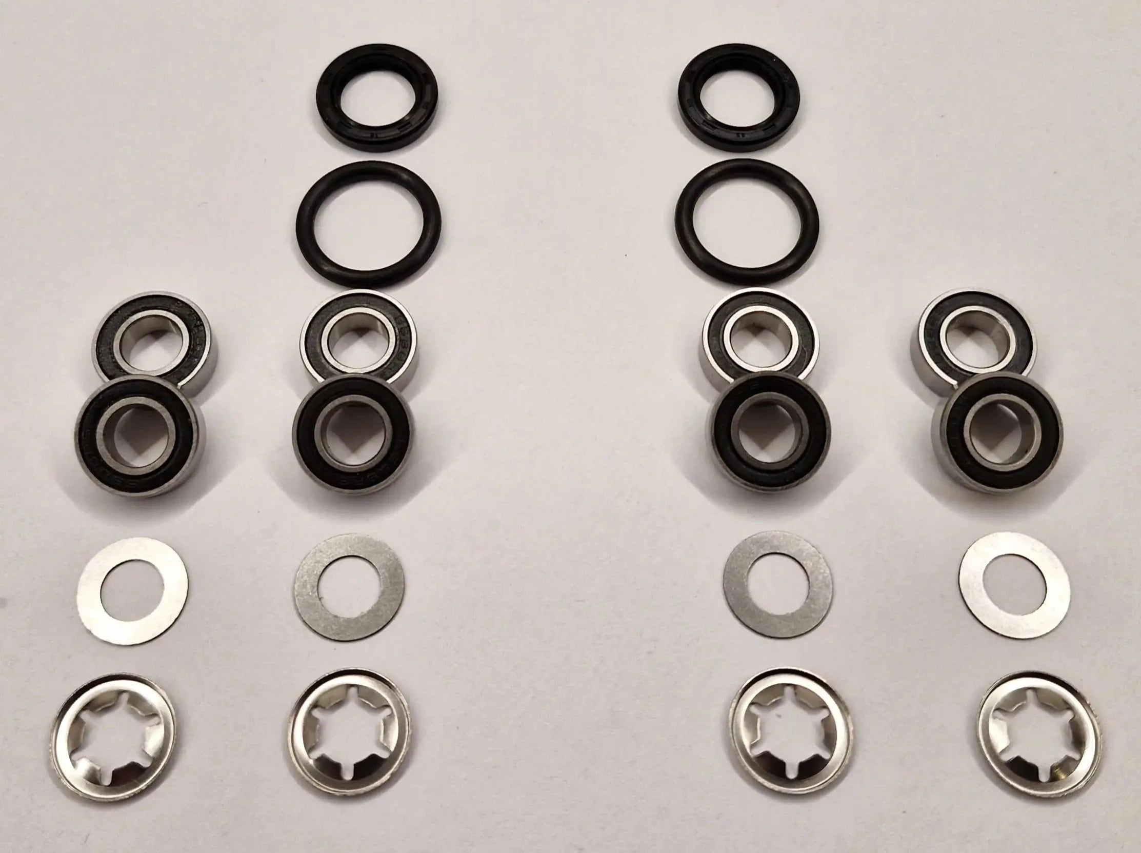 Repair kit for front wheels and turning bearings on Husqvarna Automower with 8mm wheel axle. Stainless bearings and lock washers.